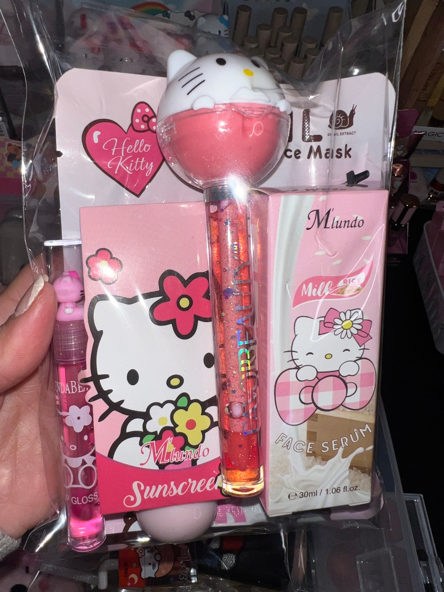 A Hello Kitti, Kuku, Melo, Cina and More lipgloss and accessories pre-pack bundles