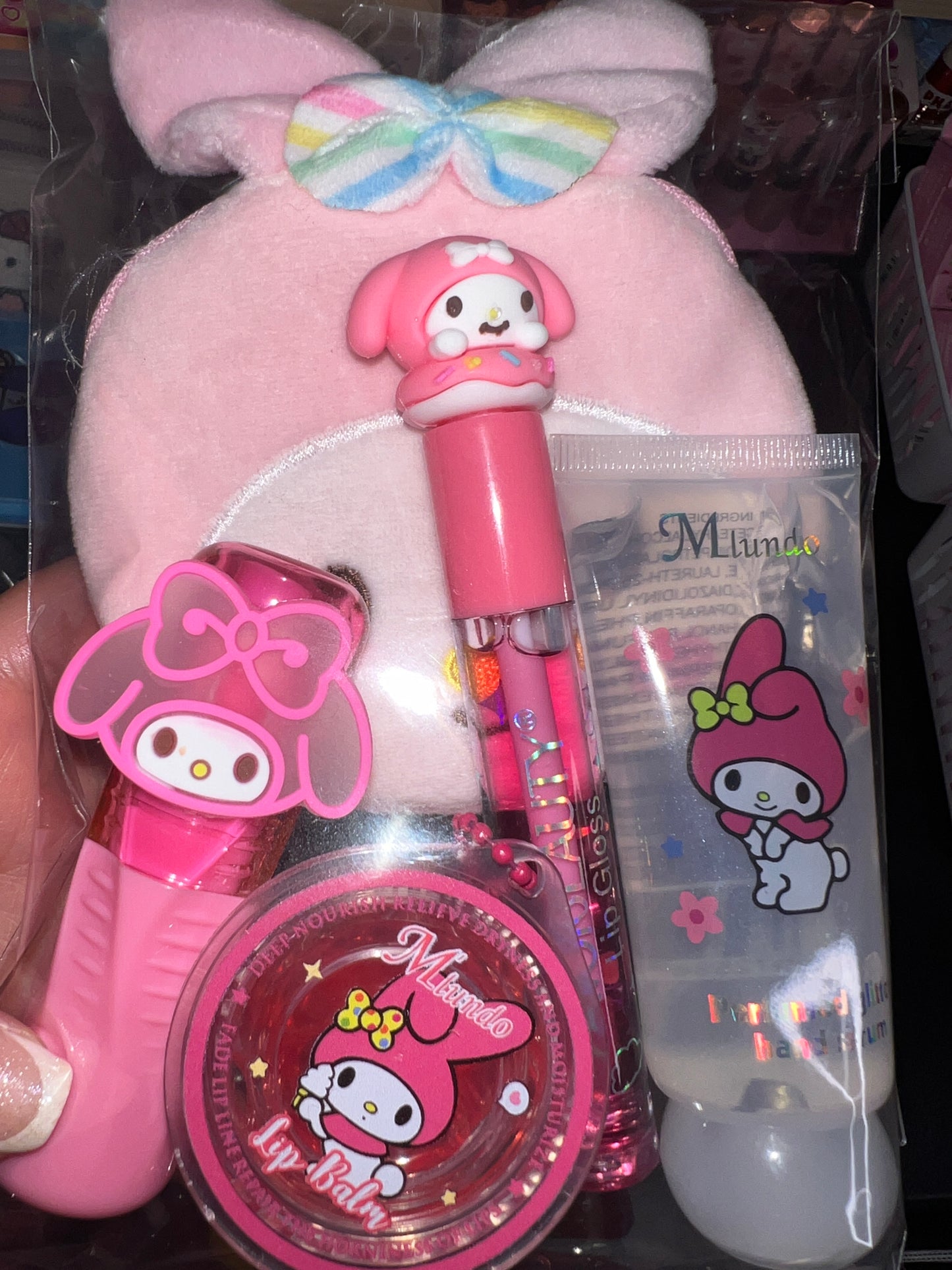 A Hello Kitti, Kuku, Melo, Cina and More lipgloss and accessories pre-pack bundles