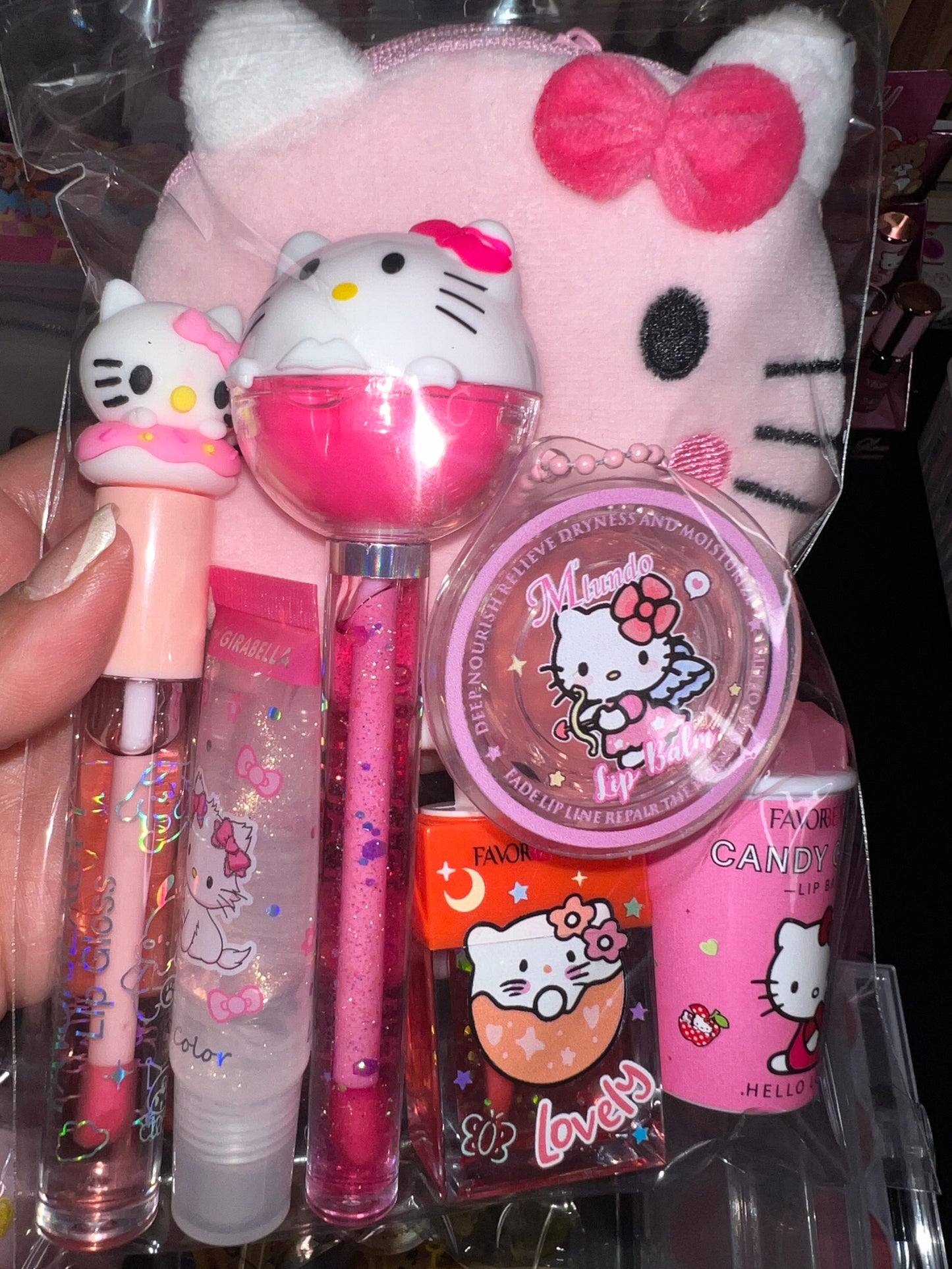 A Hello Kitti, Kuku, Melo, Cina and More lipgloss and accessories pre-pack bundles