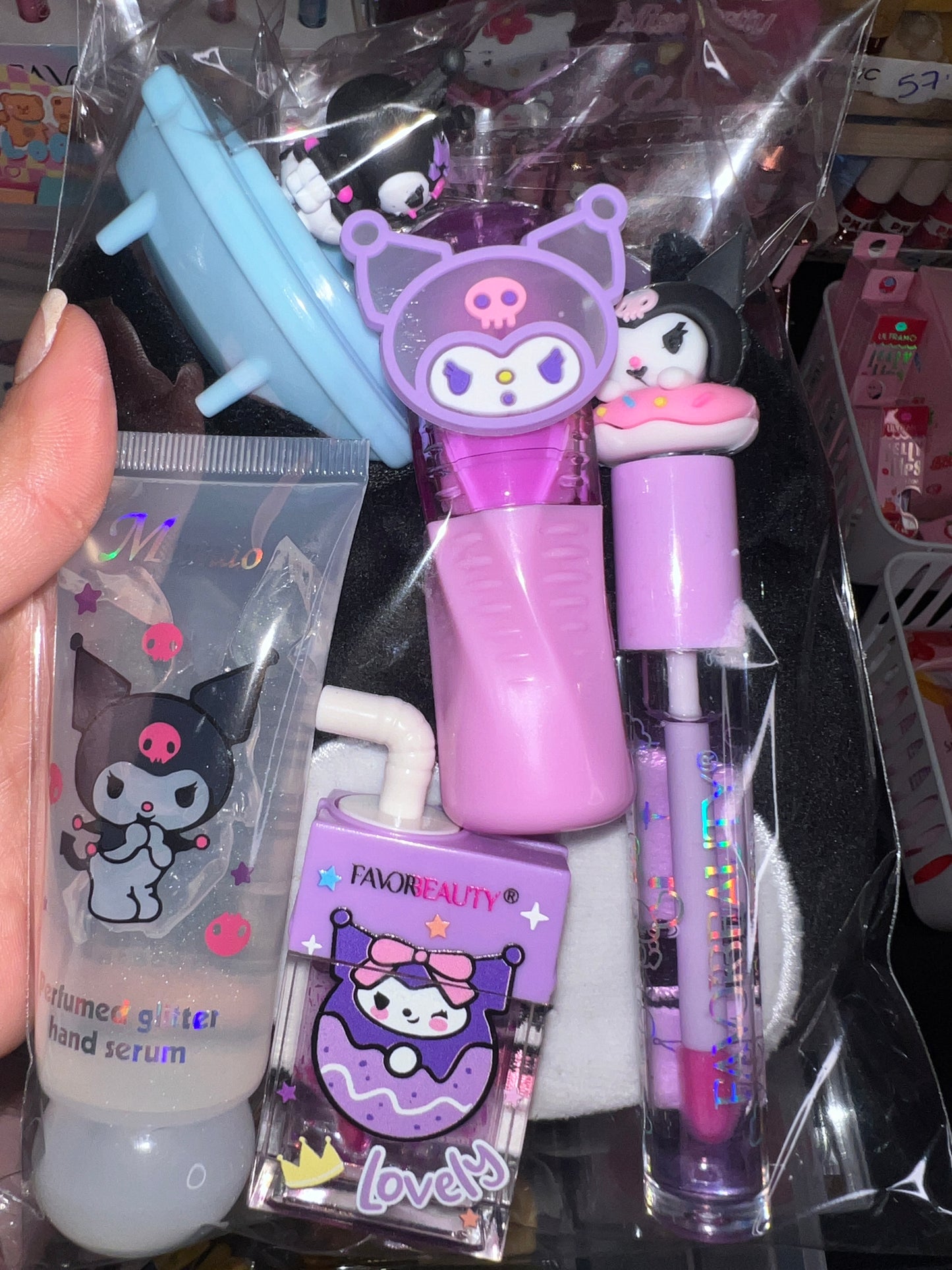 A Hello Kitti, Kuku, Melo, Cina and More lipgloss and accessories pre-pack bundles